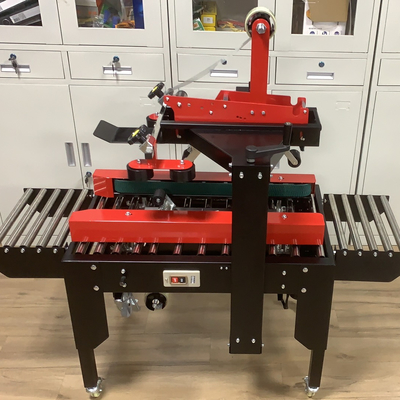 Con motor eléctrico, caja de cartón de caja semiautomática, sellador de cinta con sola rueda universal