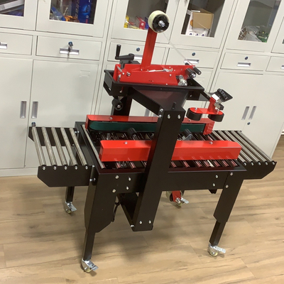 Con motor eléctrico, caja de cartón de caja semiautomática, sellador de cinta con sola rueda universal