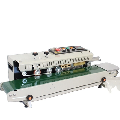 Velocidad de sellado 0-12m/min 29kg FR-990 Máquina de sellado térmico popular para envases de alimentos