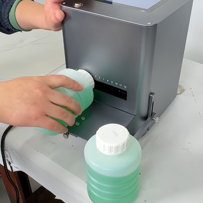 Impresora de inyección de tinta térmica de escritorio para codificación de fecha de caducidad a mano fácil de operar y compacta